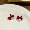 Pendientes colgantes de lazo de terciopelo retro francés para otoño e invierno, nuevos pendientes elegantes y suaves de alta gama que combinan con todo para mujer.