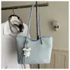 Bolso de mano vintage para mujer, nuevo modelo 2026, bolso de hombro versátil de nicho de alta gama, bolsa de mano tipo tote de gran capacidad para el trabajo