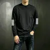 Camiseta casual versátil de manga comprida para outono para homens, gola redonda, cor sólida da moda, confortável, respirável e com caimento solto