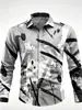 Nova camisa masculina de manga longa com um design abstrato apresentando fundo azul e pinceladas pretas, rosas e brancas espalhadas livremente, um top casual versátil