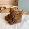 Botines cortos de lazo estilo coreano para niña 2026 otoño e invierno nuevos zapatos de una sola suela zapatos de princesa de gamuza para niños botas de suela blanda para bebé