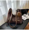 Bolsa Tote Transfronteiriça para Mulheres, Grande Capacidade, Nova Bolsa de Ombro Transversal Retro Fosca Outono/Inverno 2026, Mochila Multifuncional