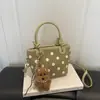 2026 Otoño Temprano Nuevo Exquisito Bolso Cruzado de Lunares para Mujer Bolso de Cubo Vintage de Gamuza de Moda Bolsos para Mujer al por Mayor