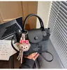 Diseño de Nicho para Mujer Transfronterizo 2026 Nuevo Bolso Popular Súper Trendy Primavera/Verano Versátil Casual Hombro Cruzado Bolso Cubo