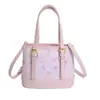 Bolso de mano de nicho para mujer 2026 nuevo de moda primavera alta gama lujo ligero bolso de hombro exquisito bolso cruzado tipo cubo