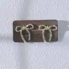 Pendientes de Aro Dorados Más Vendidos para Mujer, Pendientes de Exportación, Sencillos y de Moda, Pendientes Brillantes y Elegantes, Al Por Mayor Exquisitos de Nuevo Estilo