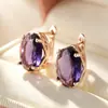 Aretes de aro dorados de lujo ligero, ovalados, con circonita cúbica morada para mujer, con delicados diseños huecos y engastes de cristal, perfectos para el uso diario y versátiles para cualquier atuendo