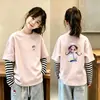 Nueva camiseta de algodón puro a rayas y retazos de manga larga para niños para primavera y otoño, corte holgado, elegante, adecuada para que la usen las niñas como prenda exterior.