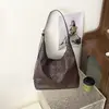 Bolso de textura tejida para mujer 2026 nuevo de verano retro de lujo ligero para el trabajo y el día a día, gran capacidad, de un solo hombro, cruzado