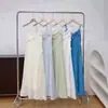 Vestido de Suspensório Primavera e Verão 2026 Novo Vestido Azul com Bordas Franzidas, Vestido de Férias Estilo Francês