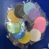 Artículos populares de venta caliente transfronterizos pala de madera algodón comprimido esponja facial limpieza forma de corazón modelo popular flores de mariposa protección ambiental esponja facial limpieza