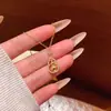 Popular Colgante de Calabaza Dorada Pequeña de la Fortuna Estilo Chino Collar de Acero de Titanio para Mujer, Cadena de Clavícula Exquisita de Lujo Ligero de Alta Gama