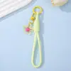 Estilo ins pingente de flor de resina transparente vazada para chaveiro de celular flores pequenas coloridas corda trançada de poliéster pingente versátil para bolsa
