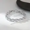 Pulseira Elegante de Mão com Zircônia Micro-Pavimentada Eletrodepositada em Ouro Real para Mulheres, Bracelete Oval Geométrico de Alta Qualidade, Estilo Europeu e Americano, Bracelete de Luxo Acessível