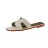 Nuevas Sandalias Planas de Verano 2026 Estilo H para Mujer, Chanclas de Moda para Exteriores, Sandalias de Playa Versátiles Antideslizantes, Calidad de Exportación