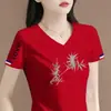 Itens de superávit no comércio exterior transfronteiriço: Camisetas de manga curta de marca com corte solto para mães de meia-idade, blusas casuais estampadas estilo chinês com corte justo