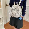 Mochila con lazo en forma de corazón estilo coreano para mujer, mochila vintage de pana con cierre de cordón y solapa, versátil para el trabajo y para estudiantes