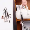 Novo Pingente de Bolsa Série Miu Corda Trançada à Mão DIY Chaveiro Versátil Presente para Casal Desenho Animado Atacado