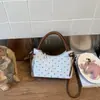 Bolsa de Mão Estilosa de Verão para Mulheres 2026 Nova Tendência Moda Coreana Bolsa Saco de Bolinhas Versátil Bolsa Transversal