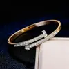 Pulsera de Acero Inoxidable Transfronteriza Estilo Europeo y Americano Pulsera de Trébol de Cuatro Hojas Chapada en Oro de 18 Quilates Pulsera Versátil de Acero de Titanio con Trébol para Mujer