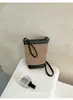 Bolso bandolera retro de nicho de moda para mujer 2026 nuevo bolso de cubo cruzado de moda casual para salidas y teléfonos móviles