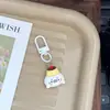 Chaveiro fofo de desenho animado de foca adorável, bolinho de pudim, charme feminino para mochilas de estudantes, presente para melhores amigos