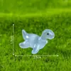 Novo produto transfronteiriço: dinossauro de desenho animado brilhante em miniatura para terrários, jardinagem e decoração DIY; ornamentos em miniatura