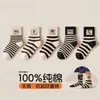 Dropshipping de meias infantis para meninos e meninas, meias de algodão respiráveis de cano médio para primavera e outono, meias esportivas de alta elasticidade da moda para outono e inverno