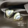 Fábrica de Origen En Stock Venta Caliente Transfronteriza Pendientes de Acero de Titanio, Perlas de Gota de Agua con Forma de Corazón, Varios Estilos de Clavos para Orejas, Modernos y de Alta Gama