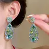 Aretes de aguja plateada con diamantes, borlas geométricas de perlas, ultra brillantes, lujosos y exquisitos, personalizados y elegantes, aretes de alta gama
