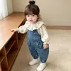 Conjunto de Duas Peças Estilo Coreano para Meninas Moda Outono 2026 Versátil Floral Camisa Boneca Macacão Jeans Conjunto Tendência