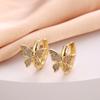 Pendientes de estilo frío de alta calidad con diseño de nicho de oro real galvanizado con circonita de cobre a juego de moda europea y americana para mujer