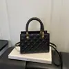 Nuevo modelo de otoño temprano 2026, bolso de mano sencillo con patrón de diamantes para mujer, bolso cruzado de moda con textura, bolso de hombro, bolsos de mujer al por mayor