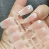 Blush pêssego com leite 30 peças de tira de unha trapezoidal curta sem costura semiacabada especial fosca para usar adesivo de unha unha pré-fabricada