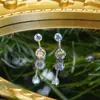 Nuevo piercing de ombligo de circón nuevo anillo de ombligo de lujo ligero chica popular nicho piercing de ombligo de acero inoxidable cobre incrustado circón nuevo transfronterizo