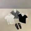 Wgwe10133 Guangzhou Shisanxing Moda Feminina 2026 Verão Novo Estilo Coreano Gola V Ombro Normal Manga Curta Camiseta Top Fino