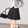 Novo Estilo Outono e Inverno 2025 Fresco Estilo College Saia de Lã com Bolsos e Pregas Cintura Alta Justa