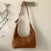 Bolsa de Camurça Estilosa Transfronteiriça Formato Dumpling para Mulheres Outono e Inverno 2025 Nova Bolsa de Ombro Único Transversal Versátil de Alta Qualidade e Grande Capacidade