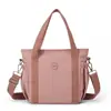 Nuevo bolso de mano informal simple de gran capacidad transfronterizo, tejido de nailon ligero, moda para mujer, bandolera versátil para el día a día