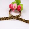 Venta al por mayor de fábrica 0.8 mm trenza encaje dorado accesorios de ropa cortina accesorios de encaje financiero encaje de color