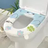 Cubierta impermeable y engrosada para asiento de inodoro, adecuada para todas las estaciones, con un diseño lindo y cálido para el invierno, e incluye un asa