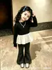 Top base de niña con volantes, estilo dos piezas falso, colección otoño 2026, top negro brillante con volantes estilo coreano de manga larga
