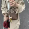 2025 Nuevo Bolso de Mano Versátil de Moda Bolso Tejido Casual Bolso Sencillo de Cubo Bolso de Hombro para Viajes Diarios Bolso Cruzado de Moda