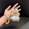 Pelúcia de Cachorro Cacheado Ursinho de Pelúcia Boneca Pingente de Bolsa Fofo Adorável Decoração de Mochila Chaveiro de Casal