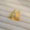 Anillo de acero de titanio ajustable con explosiones transfronterizas al por mayor anillo retro de acero inoxidable con presión de aceite apertura anillo de pareja para hombres y mujeres
