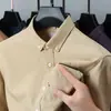 Camisa de algodón mercerizado para hombre de manga larga 2023 nueva primavera y otoño camisa de algodón casual para hombre bolsillo real top profesional