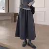 Falda midi gruesa de color gris oscuro con estampado floral para mujer, nueva colección otoño 2026, con cintura elástica, diseñada para estilizar la figura y crear un efecto adelgazante