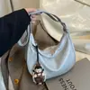 Bolso Simple de Moda de Gran Capacidad para Mujer 2025 Nuevo Textil Nicho Bolso de Hombro Cruzado Versátil Bolso Explosivo de Bolita