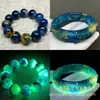 Pulseras Redondas de Cuentas de Arena Dorada Luminosa de Ámbar de Cera de Abeja Transmitidas en Vivo, Estilo Unisex, Porcelana Azul con Efecto Luminoso Único