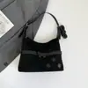 Moda de moda Versátil Gran capacidad Bolso de hombro Bolsos de alta gama Bolso de mano para el trabajo Bolso cruzado único de nicho elegante